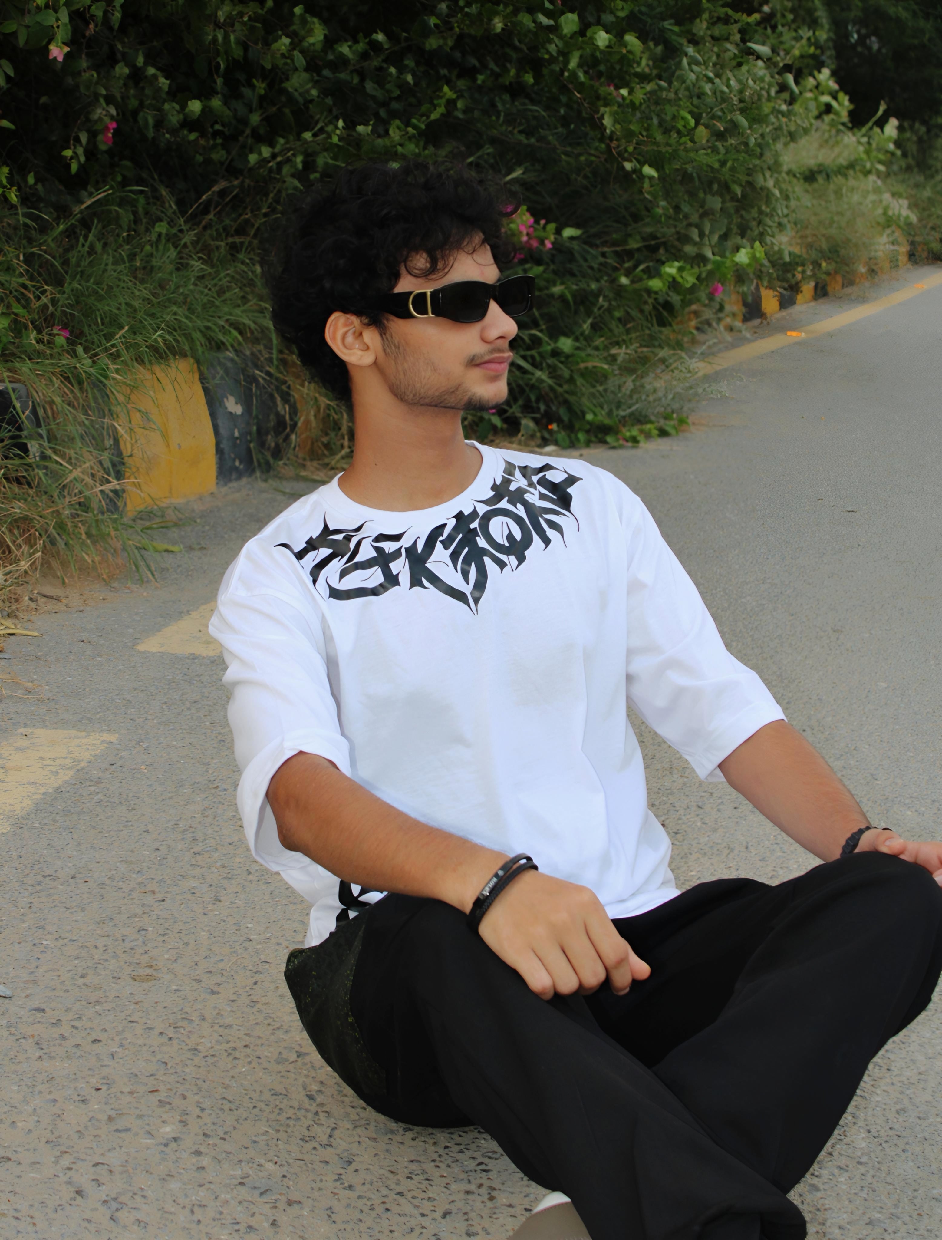 Crafted from soft fine cotton fabric this Arabic Calligraphy Dropshoulder Tshirt offers a cool feel . Whether you're heading to the gym or out for a night on the town, this versatile piece is a must-have. Shop now and experience the comfort and style of Fashion Wears .